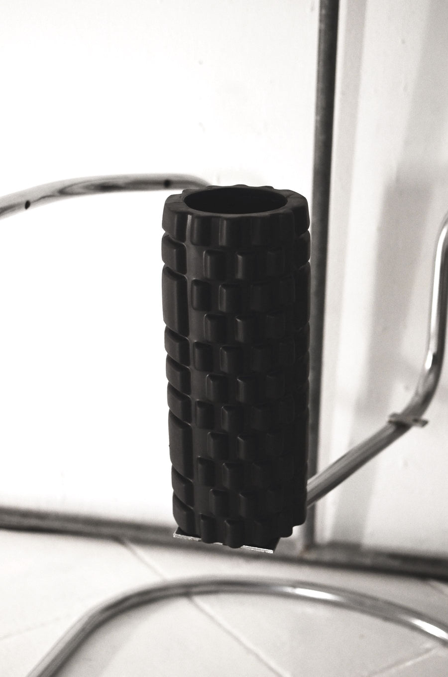 Textured Foam Roller — Firm, multi-density surface for rolling out legs, back and hips.