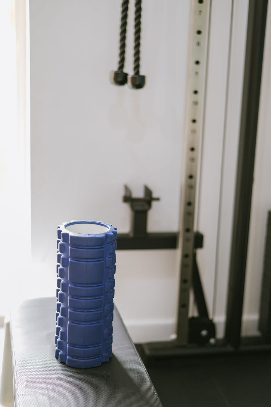 Muscle Roller Stick — Handheld roller stick for calves, quads and post-run recovery.