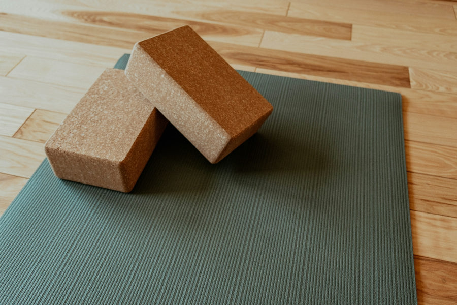 Recovery Yoga Mat & Blocks — Cushioned non-slip mat with two support blocks for stretching and floor work.